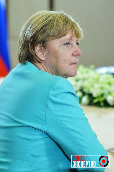 Путиным и Меркель обсуждена ситуация на Украине 
